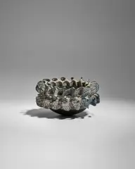 Whorl-Pinched Bowl by Paul S. Briggs, pinched-formed, glazed black stoneware, artist's monogram mark 'PB' to the underside, sold Dec 2024