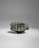 Paul S. Briggs, Whorl-Pinched Bowl, pinched-formed, glazed black stoneware, artist's monogram mark 'PB' to the underside