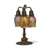 Tiffany Studios, Newel Post Lamp, Favrile glass, patinated bronze, base stamped 'TIFFANY STUDIOS NEW YORK 339' on underside, two of the shades engraved '5 - L
