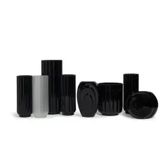 George Sakier, Group of Eight Vases, for Fostoria Glass Company, mold-blown glass, one bearing Fostoria paper label