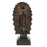 MÉXICO, SIGLO XX by Virgen de Guadalupe, Bronce, patinado en color marrón; con base de mármol negro, offered Dec 2024