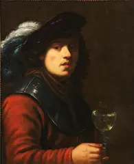 A Young Man Holding a Goblet by Rembrandt Harmensz van Rijn, Oil on canvas, offered Nov 2011