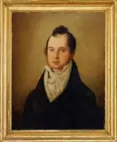 Unsigned, Portrait of a Gentleman, Oil on canvas mounted to masonite half portrait of a man wearing a top coat with white collar