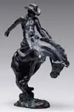 Duke Sundt, Bronco Buster, Bronze depicting a cowboy on a bucking horse on a naturalistic base signed “DUKE”. Having foundry mark and 6/15