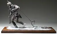 Jud Hartmann, Snowshoe Brave, Bronze Mounted on a walnut molded edge board