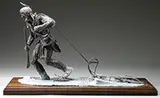 Jud Hartmann, Snowshoe Brave, Bronze Mounted on a walnut molded edge board