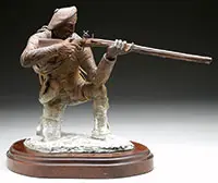 Jud Hartmann, Trapper, Bronze Mounted on a shaped wood plinth
