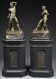 Pietro Chiapparelli, Pair of Classical Pugilist Figures, Bronze Accompanying each bronze is a marble oval base. These sit atop a faux marble tall painted wood stand