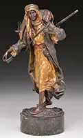 Franz Xavier Bergman Foundry, Arab with Rifle and Sable Antelope, Cold-painted polychrome bronze Foundry mark on bottom of coat, also numbered on bottom Mounted on a marble base