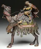 Bergman Foundry, Arab Man and Camel Being Attacked by a Lion, Bronze
