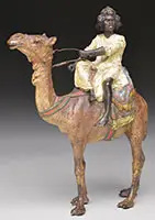 Boy on Standing Camel by Unsigned, Cold-painted polychromed bronze, sold Aug 2013