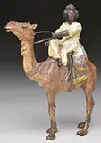 Unsigned, Boy on Standing Camel, Cold-painted polychromed bronze