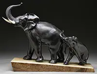 Elephant with Young by Irénée Rochard, Patinated cast metal set on a two-color onyx sloped base, sold Aug 2013