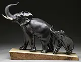 Irénée Rochard, Elephant with Young, Patinated cast metal set on a two-color onyx sloped base