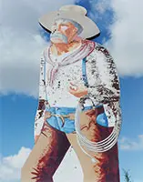 Jim Dow, Cowboy Sign, the Enchanted Highway Mandan North Dakota” 2003, Color photograph on Fuji color crystal archive paper