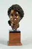George Lundeen, Bust of Young Woman, Bronze of young woman with long hair gathered in a bun