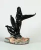 Lebuse, Mermaid and Dolphins, Carved black coral sculpture shows a mermaid amongst five dolphins