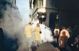 Joel Meyerowitz, Camel coat couple in street steam, New York City, 1975, Dye transfer print