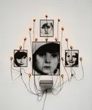 Christian Boltanski, Untitled, 1989, Mixed media installation comprised of 4 gelatin silver prints, 18 electric lights and biscuit tin with enclosed handkerchief