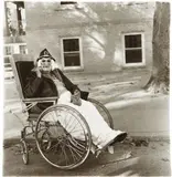 Masked woman in wheelchair, P.A. by Diane Arbus, 1970, Gelatin silver print, printed later by Neil Selkirk, sold Oct 2014