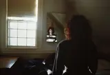 Self-portrait in the mirror, The Lodge by Nan Goldin, 1988, Dye destruction print, printed later, sold Oct 2014