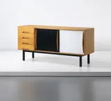 Sideboard, from the Cité Cansado, Mauritania by Charlotte Perriand, circa 1958, Ash-veneered wood, oak, plastic-laminated plywood, painted metal, sold Jun 2014