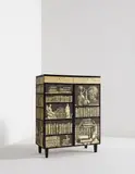 "Libri" cabinet by Piero Fornasetti, 1950s, Lithographic transfer-printed wood, mahogany, pine, painted wood, brass, sold Jun 2014