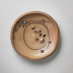 Large charger by Peter Voulkos, 1978, Gas-fired wheel-thrown and manipulated stoneware with porcelain pass-throughs, drawing and punctures with cobalt slip/ox, sold Jun 2014