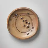 Large charger by Peter Voulkos, 1978, Gas-fired wheel-thrown and manipulated stoneware with porcelain pass-throughs, drawing and punctures with cobalt slip/ox, sold Jun 2014