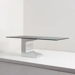 Working prototype dining table, from the editioned series for the firm Móveis Teperman Ltda., Brazil by Oscar Niemeyer, circa 1990, Stainless steel, glass, sold Jun 2014