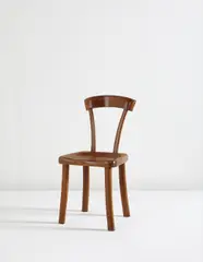 Side chair by Alexandre Noll, circa 1945, Mahogany, offered Dec 2014