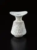 Vase with fluted body by Lucie Rie, circa 1976, Stoneware, white and blue pitted glaze, sold Dec 2014