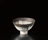 Bowl with drips by Lucie Rie, circa 1978, Porcelain, layered white glazes with manganese lip, sold Dec 2014