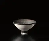 Conical bowl by Lucie Rie, circa 1980, Porcelain, manganese glaze, sgraffito and inlay, sold Dec 2014