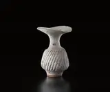 Vase with fluted body by Lucie Rie, circa 1980, Stoneware with manganese elements, pitted blue-gray glaze, offered Dec 2014
