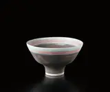 Bowl with inlaid lip by Lucie Rie, circa 1978, Porcelain, gray body with pale blue lip with horizontal bands of pink inlay, sold Dec 2014