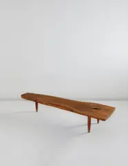 Slab coffee table by George Nakashima, designed circa 1945, American black walnut, sold Dec 2014