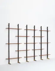 Wall-mounted "Lib 2" bookcase by Ignazio Gardella, circa 1955, Brazilian rosewood-veneered wood, painted metal, brass, offered Dec 2014