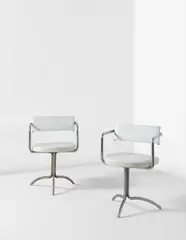 Frederick John Kiesler, Pair of armchairs, designed for Charles and Marguerita Mergentime, New York, 1935, Chromium-plated tubular steel, painted plywood, leather, vinyl, metal springs