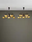 Pair of ten-armed “Cascade" ceiling lights, with type 1/1 shades by Poul Henningsen, circa 1933, Patinated tubular brass, opaque glass, Bakelite, offered Dec 2014