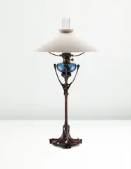 Hector Guimard, Rare table lamp, from the Maison Coilliot, Lille, circa 1900, Patinated bronze, colored blown glass, clear glass chimney, painted brass, brass, fabric shade