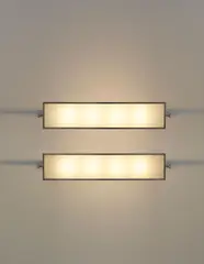 Pierre Legrain, Pair of wall lights, from the study of Roger Martin du Gard, Paris, circa 1926, Nickel-plated metal, frosted glass