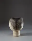 Important and large goblet form with vertical impressions by Hans Coper, 1968, Stoneware, layered white porcelain slips and engobes, over a textured body, the interior with manganese glaze, sold Dec 2014