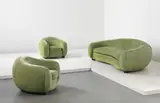 Jean Royere, "Ours Polaire" sofa and pair of armchairs, circa 1952, Mohair fabric, painted wood