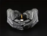 Jaume Plensa, Untitled (Hands), 2007, cast bronze and oil wick