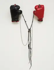 Untitled by Orlando Francisco, 1994, found boxing gloves, plastic action figures, metal chains, keys, sold May 2013