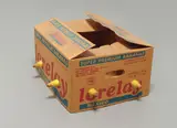 Daniel Guzmán, Untitled, 1989, cardboard box, two ceramic elephants, plastic bananas, plastic sign with string