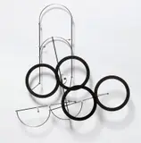 Pedro S. de Movellan, Carbon Circle Series #1, 2010, pultruded carbon fiber rod, carbon fiber laminate, aluminium brass
