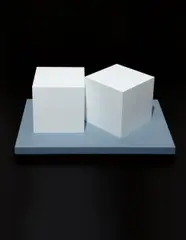 Sol LeWitt, Two Cubes, 2005, Sculpture comprised of shaped solid slabs of syntactic polyurethane and painted in lacquer,