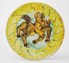 Centaure (Centaur) by Pablo Picasso, 1956, White earthenware round dish painted in yellow, red, green and black with partial brushed glaze,, sold Apr 2013